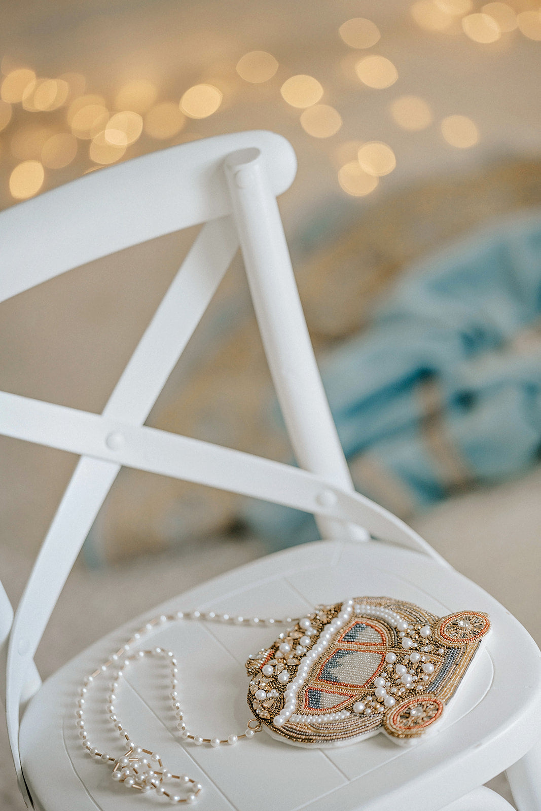 Elegant princess handbag with ornate beaded carriage, pearl strap, and vintage glamour, perfect for holiday portraits, pageants, or fairytale fashion accessories.
Storybook-inspired purse in the shape of a Cinderella coach, hand-beaded with pearls and gold thread, styled as a dreamy princess crossbody for girls or women.
Beaded pearl and gold carriage purse styled for magical dress-up, Disney travel, or special occasions like birthdays, bridal showers, or royal-themed photoshoots.