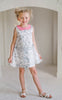 Girls twirl dress designed to be colored with fabric markers, featuring outline print
Keywords: coloring dress for kids, color-your-own twirl dress