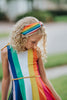 Colorful rainbow headband for girls with soft fabric and playful style