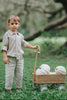 Boys beige button-up shirt with embroidered white pumpkin on chest pocket, hanging on vintage carved mirror for fall or Thanksgiving
Neutral boys fall shirt with embroidered pumpkin on pocket, styled for autumn photos, Thanksgiving, or sibling matching sets
Classic boys button-down shirt in light tan with embroidered blue pumpkin, perfect for harvest season or family portraits
Fall button-up shirt for toddlers and boys with embroidered pumpkin pocket detail, styled for Thanksgiving and heirloom outfits