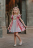 Girls sleeping beauty metallic twirl dress. Pink and white with gold accents. Puff sleeves. Cool material perfect for a hot Disney park day.