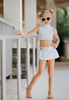 Toddler girl wearing silver and white swim outfit with intergalactic princess theme
Keywords: toddler space swimsuit, princess swim set for girls