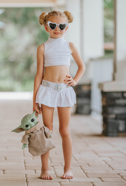 Girls two-piece swim set inspired by space princess with metallic silver and white details
Keywords: space princess swimsuit, metallic girls swimwear