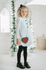 Girls snowman costume outfit with white puff dress, blue tartan scarf, and black bow shoes, styled for winter wonderland portraits or holiday school programs.

Holiday outfit for girls featuring a snowman-style white dress with bubble skirt and festive plaid scarf, ideal for Christmas plays, concerts, or photoshoots.