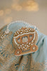 Cinderella-inspired beaded purse shaped like a royal carriage with pearl and gold detailing, styled atop a lace dress for princess birthday, Disney trip, or fairytale wedding.

Close-up of beaded gold carriage bag with pearl accents and vintage design, perfect for Cinderella costume accessory, flower girl outfit, or princess party gift.

Hand-beaded purse shaped like Cinderella’s magical carriage with ivory and gold beads, pearls, and crossbody strap, styled for Disney-loving girls or fairytale weddings.