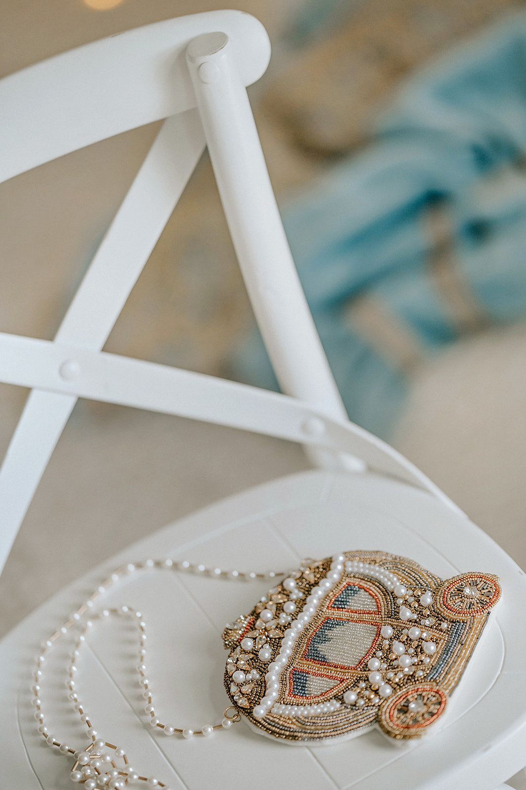 Elegant princess handbag with ornate beaded carriage, pearl strap, and vintage glamour, perfect for holiday portraits, pageants, or fairytale fashion accessories.

Storybook-inspired purse in the shape of a Cinderella coach, hand-beaded with pearls and gold thread, styled as a dreamy princess crossbody for girls or women.

Beaded pearl and gold carriage purse styled for magical dress-up, Disney travel, or special occasions like birthdays, bridal showers, or royal-themed photoshoots.