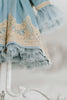 Elegant heirloom girls dress in dusty blue with gold lace trim and tulle layers, hanging on ornate vintage-style mirror

Long sleeve blue and gold embroidered holiday dress for girls, featuring pearl buttons and layered tulle hem

Girls vintage-style formal gown in soft blue with gold lace and flounce sleeves, ideal for portraits or weddings

Classic blue heirloom dress for toddlers and girls with ornate embroidery and pearl detailing, styled for a timeless photo shoot