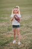 Girl wearing green “Go Spartans” headband holding a football on a grassy field at sunset, dressed in white tee and denim shorts

Child in team spirit outfit with green “Go Spartans” headband and football, perfect for game day or school pep rally

Little girl showing Spartan pride with beaded green headband and football, styled for fall sports or tailgate season

Girls football fan look with sparkly “Go Spartans” headband and casual outfit, standing in a field at golden hour