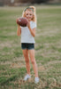 Girl wearing green “Go Spartans” headband holding a football on a grassy field at sunset, dressed in white tee and denim shorts

Child in team spirit outfit with green “Go Spartans” headband and football, perfect for game day or school pep rally

Little girl showing Spartan pride with beaded green headband and football, styled for fall sports or tailgate season

Girls football fan look with sparkly “Go Spartans” headband and casual outfit, standing in a field at golden hour