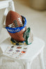 Girl wearing blue “Go Lions” headband holding football on a field at sunset, dressed in white tee and denim shorts

Child wearing sparkly blue team spirit headband that says “Go Lions,” styled with football face sticker and sporty outfit

Little girl showing team pride in “Go Lions” beaded headband while holding football during golden hour on the field

Girls football game day outfit with blue “Go Lions” headband and pigskin, perfect for team spirit wear or cheerleaders