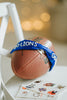 Girl wearing blue “Go Lions” headband holding football on a field at sunset, dressed in white tee and denim shorts

Child wearing sparkly blue team spirit headband that says “Go Lions,” styled with football face sticker and sporty outfit

Little girl showing team pride in “Go Lions” beaded headband while holding football during golden hour on the field

Girls football game day outfit with blue “Go Lions” headband and pigskin, perfect for team spirit wear or cheerleaders