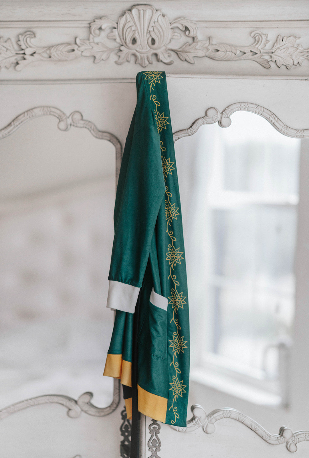 Child dressed in green Christmas pajamas with matching elf cone hat, standing in a winter-themed holiday setup

Boys festive holiday pajamas with playful Christmas print and felt elf hat, styled for family photos and Christmas morning

Toddler in Christmas sleepwear with reindeer and elf hat pattern, wearing slippers in cozy holiday backdrop with twinkle lights