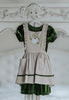 Girls green velvet dress with linen apron featuring embroidered pale blue pumpkin and ruffle trim, perfect for fall photos or Thanksgiving

Heirloom-style green velvet holiday dress with linen pinafore and pumpkin embroidery, styled for autumn or fairytale dress-up

Fall girls outfit with green velvet dress and embroidered pumpkin apron, hanging on vintage white carved mirror

Toddler to tween Thanksgiving dress with velvet base, apron pockets, and embroidered pumpkin design, ideal for family photos