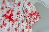 Classic holiday pajama dress for girls with red and green holly print, ruffle hem, and red satin bow at the neckline

Girls long sleeve Christmas nightgown with festive red bow and holly pattern, styled for holiday photos or heirloom gifting

Traditional girls holiday nightgown in white with red and green floral print, ruffle accents, and lace trim

Heirloom-inspired girls Christmas sleepwear with red bows and holly sprigs, perfect for festive morning photos or Christmas Eve