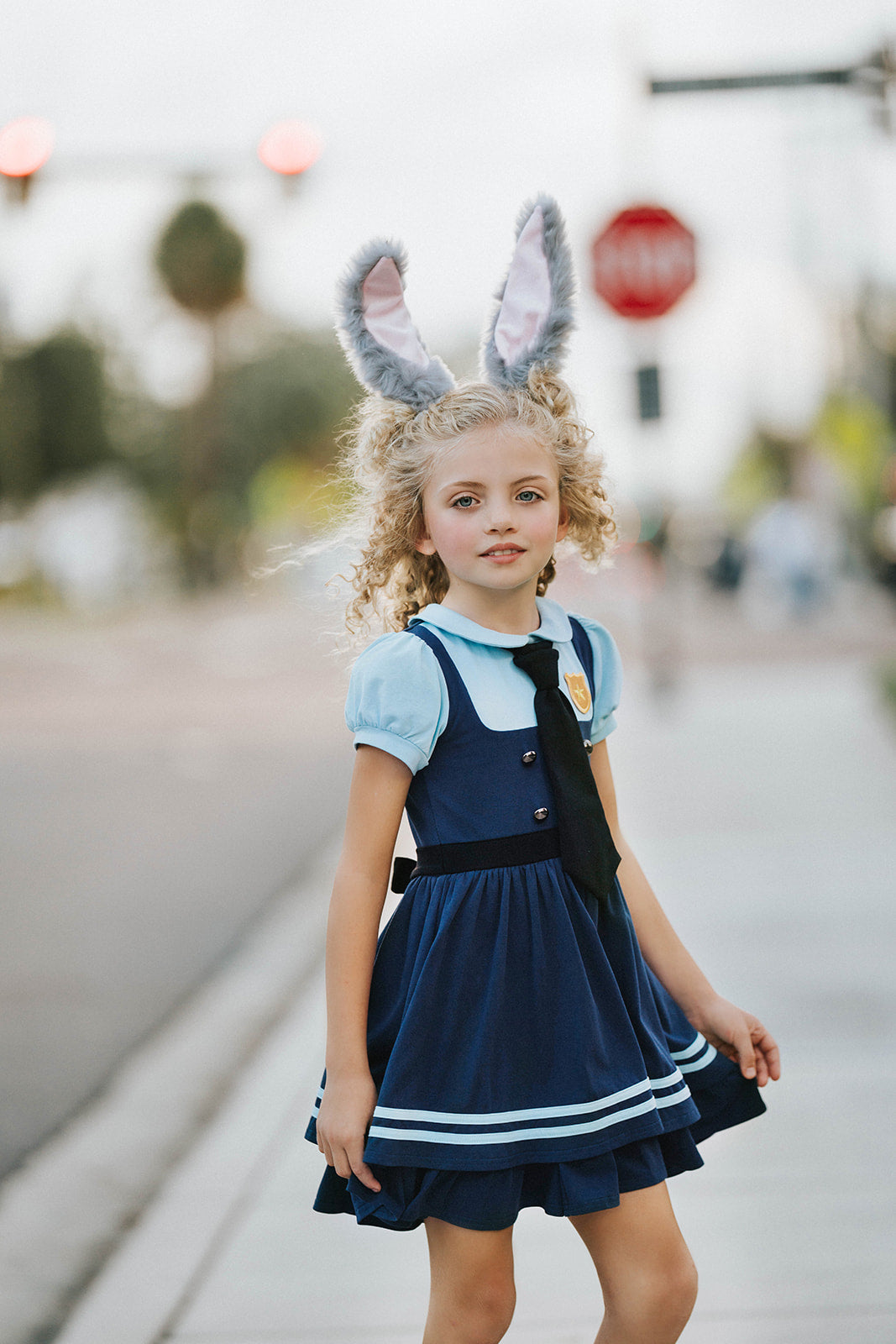 Toddler to tween Judy Hopps costume dress with pleated navy skirt, striped trim, and puff sleeve top styled like a bunny cop uniform

Girls Disneybound Judy Hopps dress with black tie, badge emblem, and blue colorblock police design, perfect for costumes and pretend play

Zootopia Judy Hopps cosplay dress for girls with puff sleeves, navy skirt, and gold badge on faux vest bodice