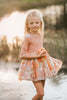 Girls Halloween dress-up outfit featuring fairy cape and pumpkin-themed tutu – whimsical fall fashion for children