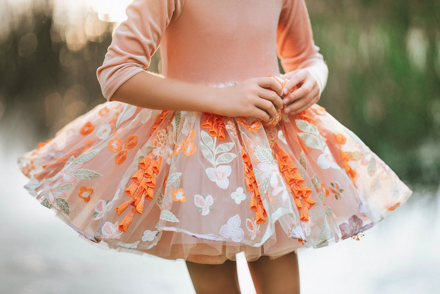 Boutique kids costume dress with matching floral cape and pumpkin tones – fairy-inspired twirl dress for fall celebrations