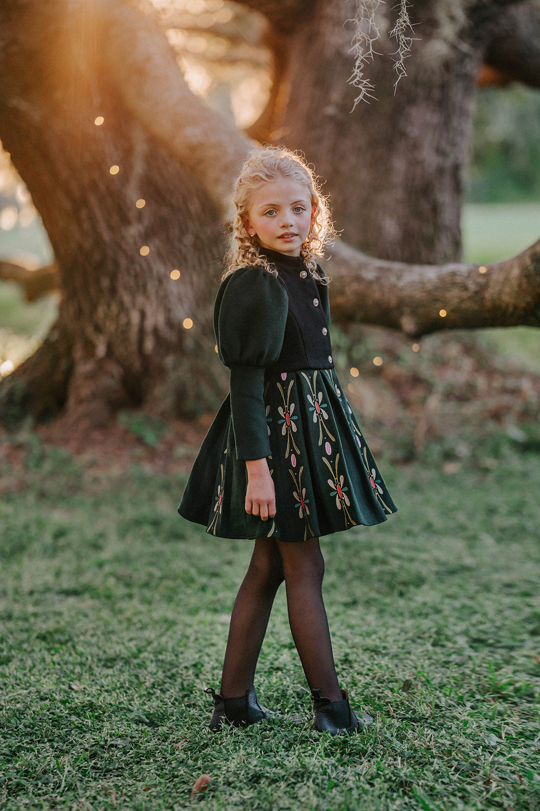 Luxury girl’s princess coat inspired by Disney Frozen characters Anna and Elsa with puff sleeves and detailed accents.

Boutique embroidered Frozen princess coat for kids, styled after Anna’s signature royal look.

Disney Frozen themed girl’s holiday coat dress, princess fashion inspired by Anna and Elsa.

Magical princess coat for girls inspired by Frozen, Anna, and Elsa with floral embroidery for special occasions.