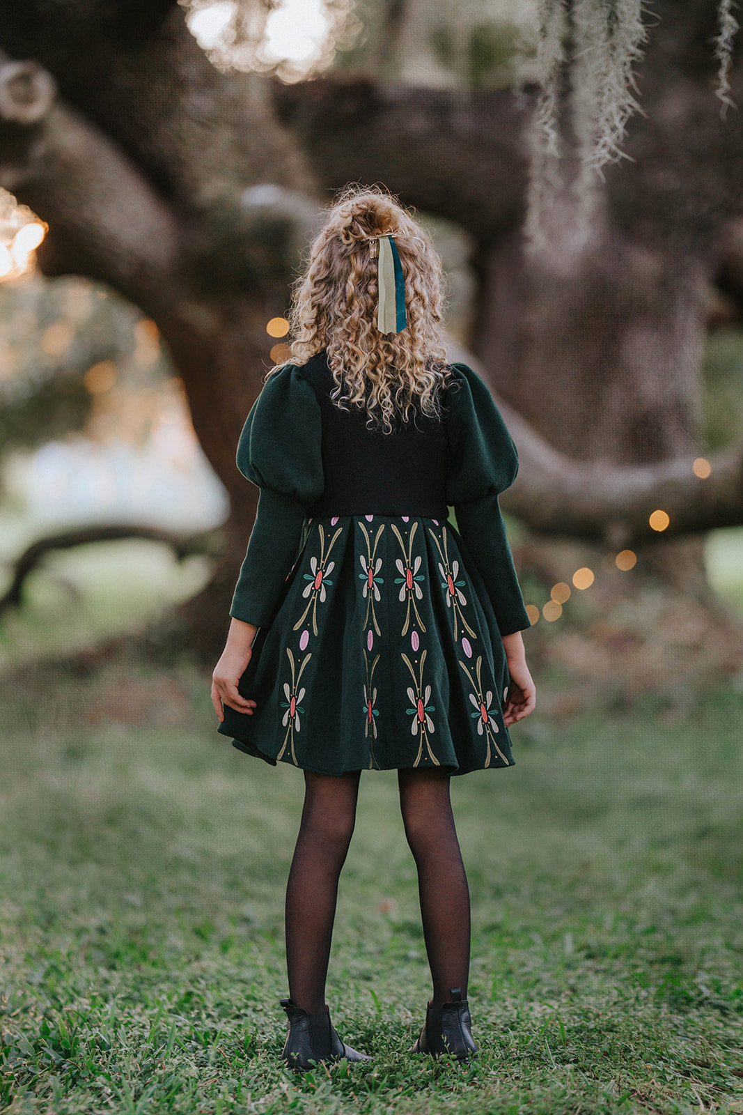 Luxury girl’s princess coat inspired by Disney Frozen characters Anna and Elsa with puff sleeves and detailed accents.

Boutique embroidered Frozen princess coat for kids, styled after Anna’s signature royal look.

Disney Frozen themed girl’s holiday coat dress, princess fashion inspired by Anna and Elsa.

Magical princess coat for girls inspired by Frozen, Anna, and Elsa with floral embroidery for special occasions.