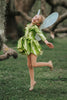 Tinkerbell-inspired metallic green coat-style dress for girls, featuring pleated skirt and jeweled embellishments

Emerald green girls dress with long sleeves and coat silhouette, styled with gold piping and crystal button accents

Formal holiday girls jacket dress in bright green metallic fabric, perfect for stagewear, fairytale parties, or winter events