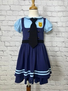 Toddler to tween Judy Hopps costume dress with pleated navy skirt, striped trim, and puff sleeve top styled like a bunny cop uniform

Girls Disneybound Judy Hopps dress with black tie, badge emblem, and blue colorblock police design, perfect for costumes and pretend play

Zootopia Judy Hopps cosplay dress for girls with puff sleeves, navy skirt, and gold badge on faux vest bodice