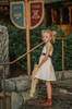 A young girl stands wearing a cotton twirl dress. There is sewn in petti skirt for volume. A geometric golden detail adorns the ivory dress.  There is a purple band with tie at the waist.  The sleevless dress comes with a golden yellow bolero with print on the front in true Arendale princess fashion.