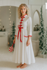 Woman wearing long white holiday nightgown with red trim, tie waist, and buttons, holding a teacup and smiling in a cozy morning setting, perfect for Christmas sleepwear.

White women's nightgown with red piping and buttons, styled with pockets and a tie waist, perfect for winter lounging, Christmas morning, or cozy holiday gift giving.

Adult holiday sleepwear for women featuring red contrast trim, full length, and soft knit fabric, styled with coffee cup in a warm, elegant home setting.
