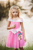 Fairytale castle crossbody purse for girls with beaded details, styled with pink velvet and tulle dress for magical playtime